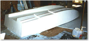 fairing the first hull to correct mold imperfections